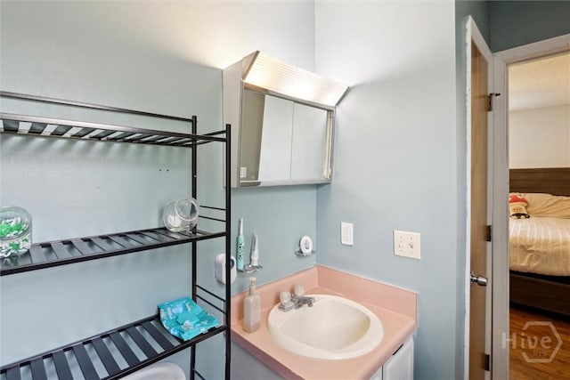 151 Ogeechee Ave, Bloomingdale, GA 31302 - ensuite bathroom with vanity and wood finished floors
