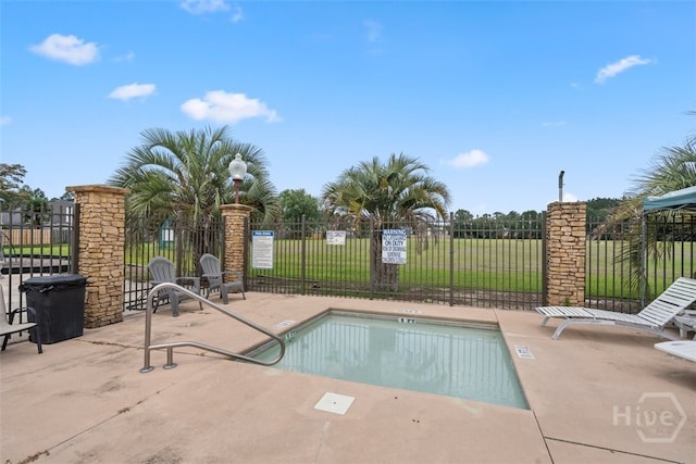210 Pebblestone Dr, Bloomingdale, GA 31302 - community pool with a patio area