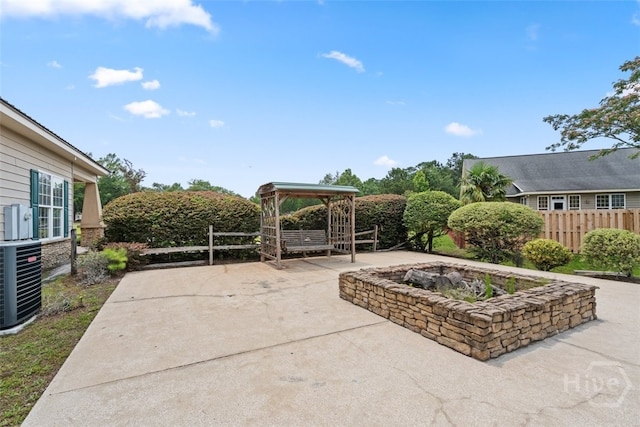 210 Pebblestone Dr, Bloomingdale, GA 31302 - view of patio with central AC unit and a gazebo
