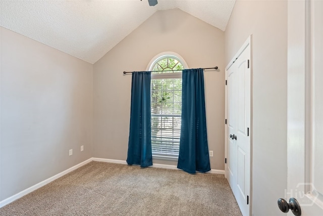 210 Pebblestone Dr, Bloomingdale, GA 31302 - unfurnished room featuring vaulted ceiling, carpet floors, baseboards, and a textured ceiling