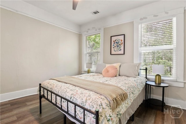 2301 Alaska St, Savannah, GA 31404 - bedroom with dark wood-style floors and a ceiling fan