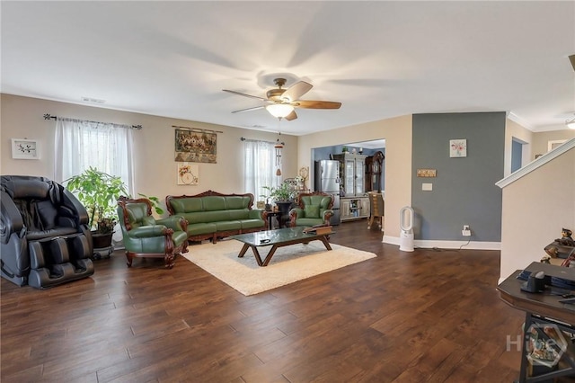 4 Broken Bit Rd, Ellabell, GA 31308 - living room featuring healthy amount of natural light, ceiling fan, and dark wood-style floors