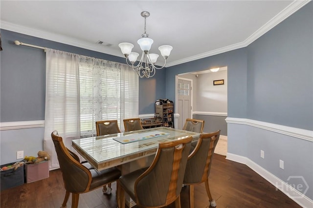 4 Broken Bit Rd, Ellabell, GA 31308 - dining space featuring a chandelier, dark wood-style flooring, and crown molding