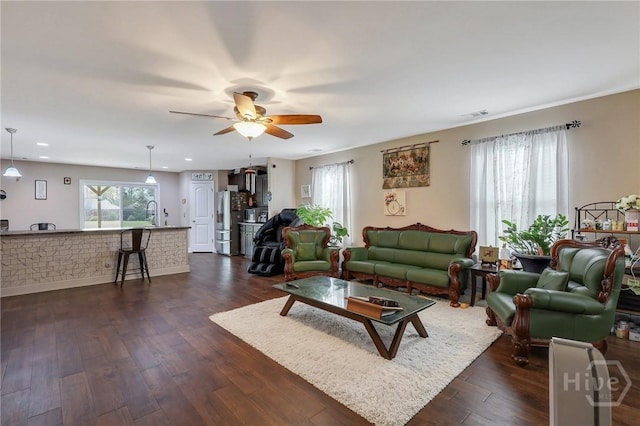 4 Broken Bit Rd, Ellabell, GA 31308 - living room featuring healthy amount of natural light, ceiling fan, dark wood finished floors, and recessed lighting