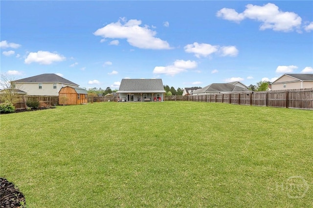 4 Broken Bit Rd, Ellabell, GA 31308 - fenced backyard featuring a storage unit