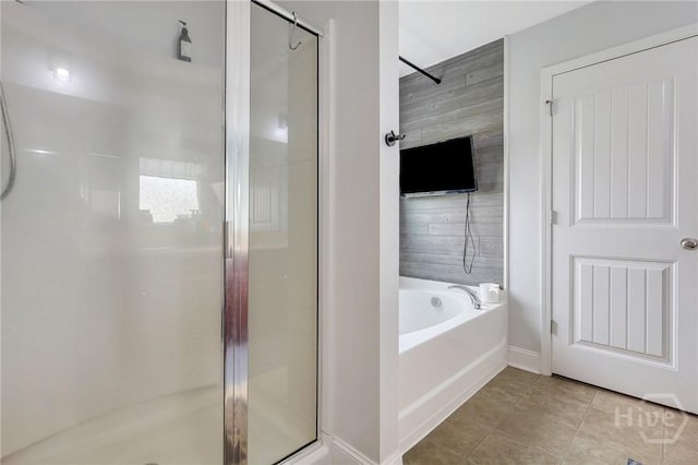 4 Broken Bit Rd, Ellabell, GA 31308 - bathroom with a shower stall, a bath, and tile patterned flooring