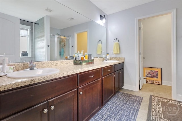4 Broken Bit Rd, Ellabell, GA 31308 - bathroom featuring double vanity, a shower stall, and tile patterned flooring