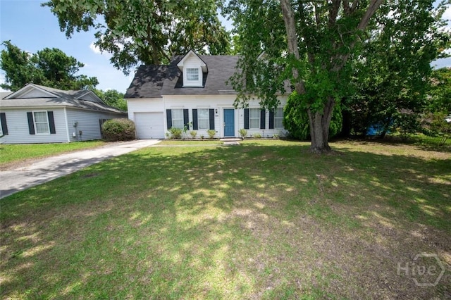 104 Ropemaker Ln, Savannah, GA 31410 - cape cod-style house with concrete driveway, a garage, and a front yard