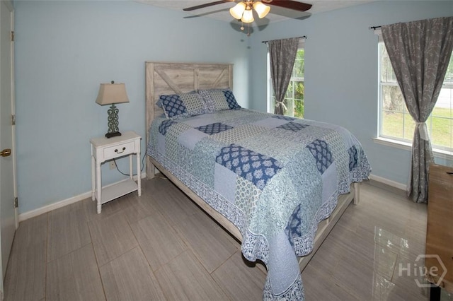 104 Ropemaker Ln, Savannah, GA 31410 - bedroom featuring baseboards, ceiling fan, and wood finished floors