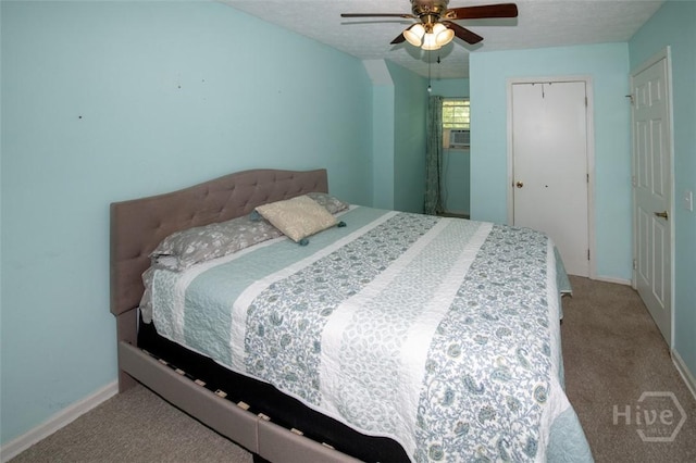 104 Ropemaker Ln, Savannah, GA 31410 - carpeted bedroom with a closet, ceiling fan, a textured ceiling, and baseboards