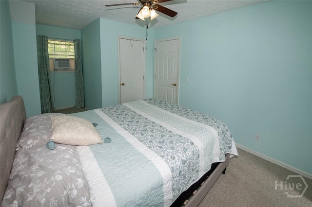 104 Ropemaker Ln, Savannah, GA 31410 - bedroom featuring cooling unit, carpet, a closet, a textured ceiling, and ceiling fan