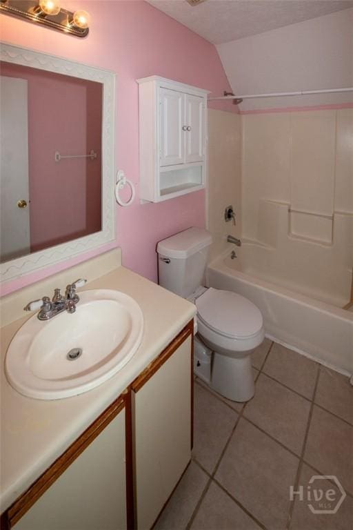 104 Ropemaker Ln, Savannah, GA 31410 - bathroom with vanity, toilet, bathing tub / shower combination, tile patterned flooring, and lofted ceiling