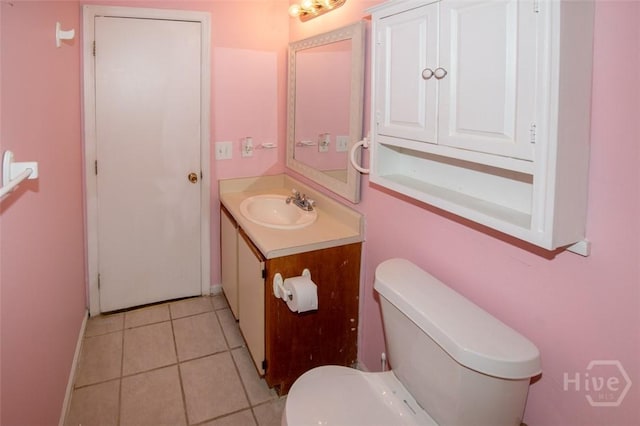 104 Ropemaker Ln, Savannah, GA 31410 - half bathroom with vanity, toilet, tile patterned flooring, and baseboards