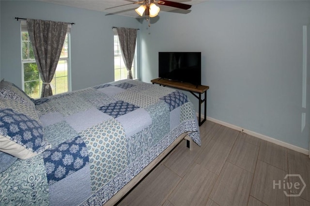 104 Ropemaker Ln, Savannah, GA 31410 - bedroom with baseboards and ceiling fan