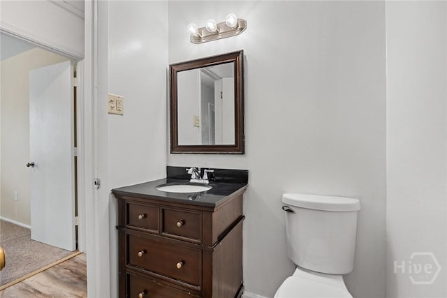 8519 Cresthill Ave, Savannah, GA 31406 - half bath with vanity, toilet, and baseboards