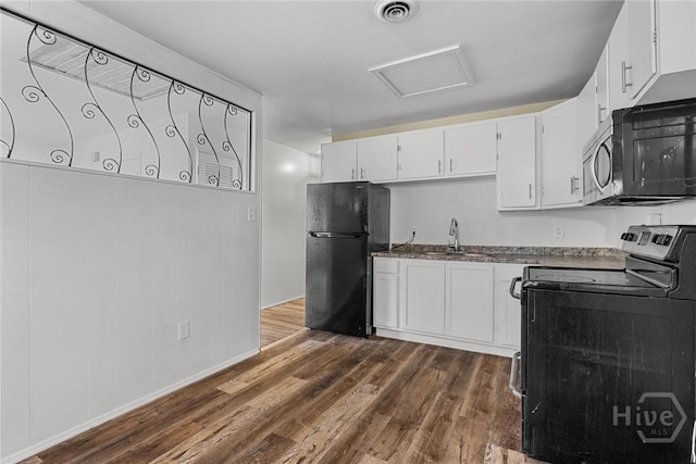 8519 Cresthill Ave, Savannah, GA 31406 - kitchen with freestanding refrigerator, electric stove, a sink, dark wood-style flooring, and baseboards