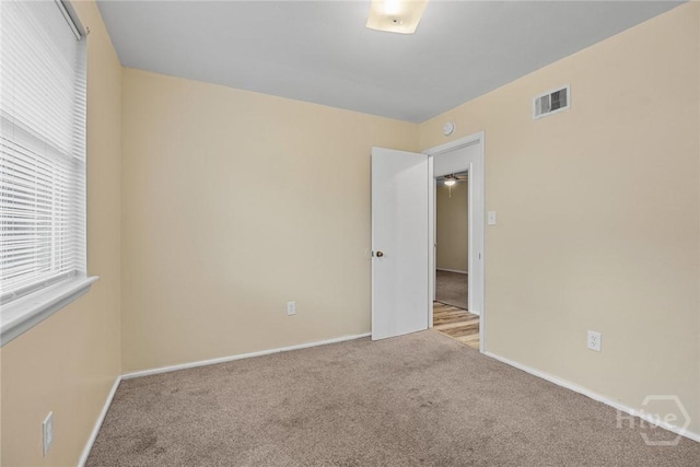 8519 Cresthill Ave, Savannah, GA 31406 - carpeted empty room featuring baseboards