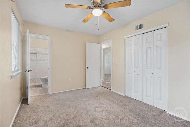8519 Cresthill Ave, Savannah, GA 31406 - unfurnished bedroom featuring carpet, baseboards, and connected bathroom