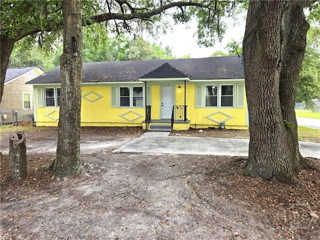 1922 Fenwick Ave, Savannah, GA 31405 - view of front of house with roof with shingles and stucco siding