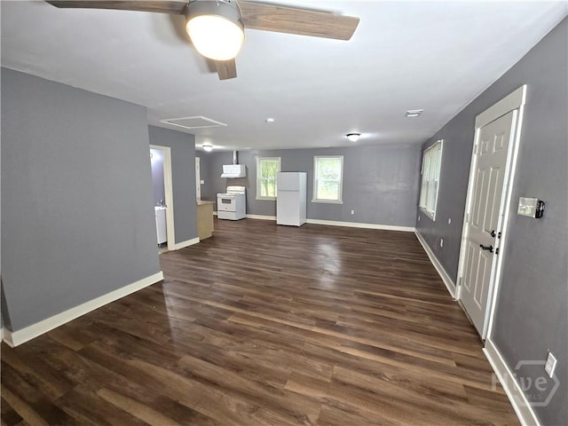 1922 Fenwick Ave, Savannah, GA 31405 - unfurnished living room featuring a ceiling fan, dark wood finished floors, and baseboards