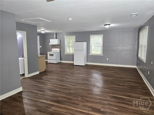 1922 Fenwick Ave, Savannah, GA 31405 - kitchen with white appliances, extractor fan, dark wood-style floors, and baseboards
