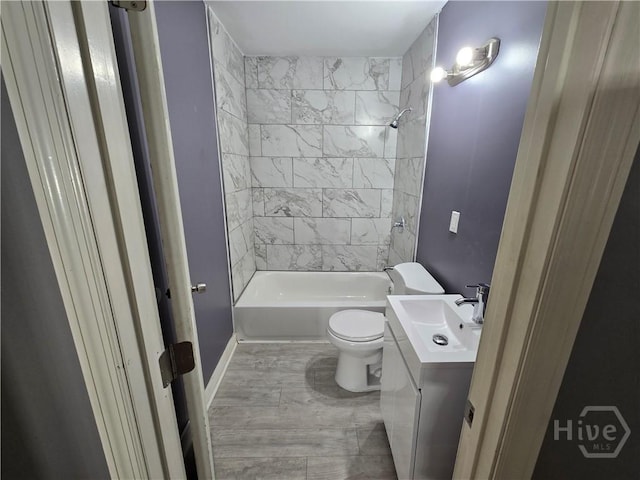 1922 Fenwick Ave, Savannah, GA 31405 - bathroom with vanity, toilet, and shower / bathtub combination