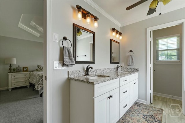 510 Braves Field Dr, Guyton, GA 31312 - ensuite bathroom with crown molding, double vanity, ceiling fan, and baseboards