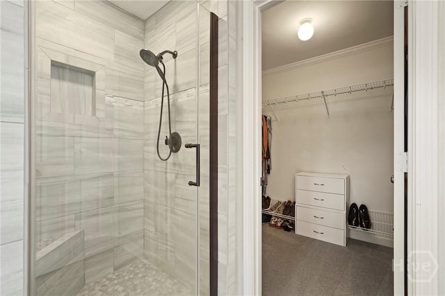 510 Braves Field Dr, Guyton, GA 31312 - full bathroom featuring a stall shower, ornamental molding, and a walk in closet