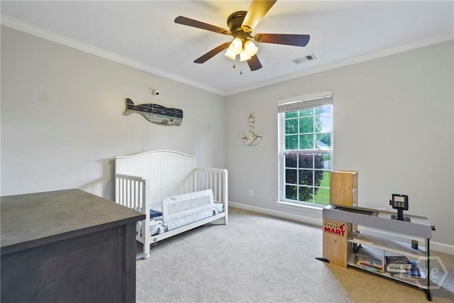 510 Braves Field Dr, Guyton, GA 31312 - bedroom with ornamental molding, carpet flooring, baseboards, ceiling fan, and a nursery area
