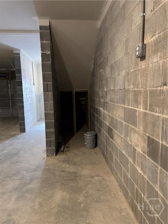 40 Hidden Pointe Dr, Savannah, GA 31419 - hallway featuring unfinished concrete flooring and concrete block wall