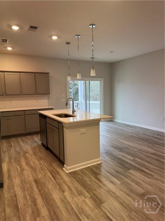 40 Hidden Pointe Dr, Savannah, GA 31419 - kitchen featuring a sink, gray cabinets, wood finished floors, dishwasher, and recessed lighting