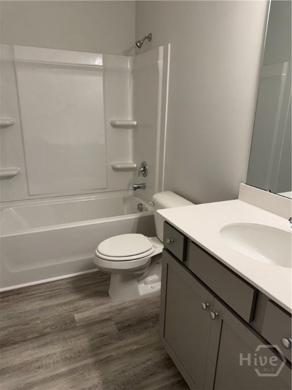 40 Hidden Pointe Dr, Savannah, GA 31419 - full bath with vanity, toilet, shower / washtub combination, and wood finished floors