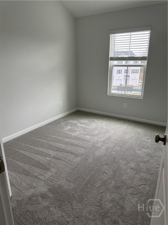 40 Hidden Pointe Dr, Savannah, GA 31419 - carpeted spare room featuring baseboards