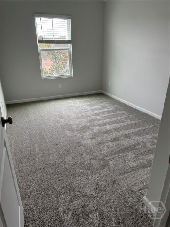 40 Hidden Pointe Dr, Savannah, GA 31419 - unfurnished room featuring carpet flooring and baseboards