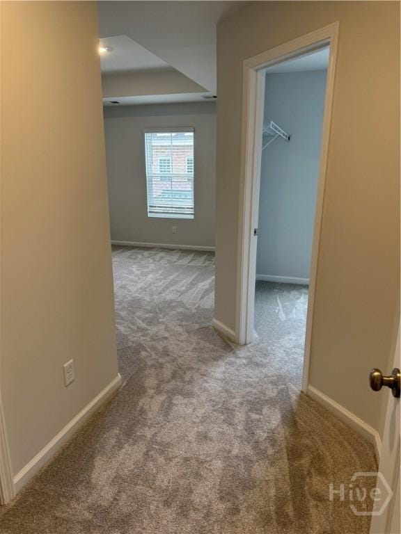 40 Hidden Pointe Dr, Savannah, GA 31419 - hallway featuring carpet flooring, baseboards, and a raised ceiling