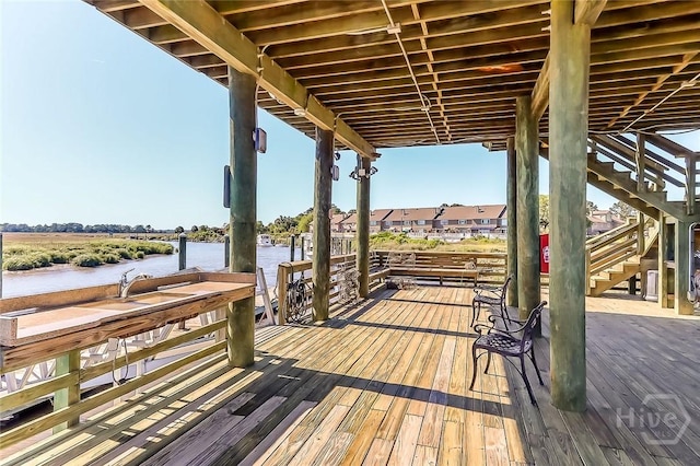 12300 Apache Ave Unit 1206, Savannah, GA 31419 - wooden deck featuring a water view and stairway