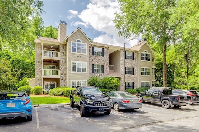 12300 Apache Ave Unit 1206, Savannah, GA 31419 - view of property with uncovered parking