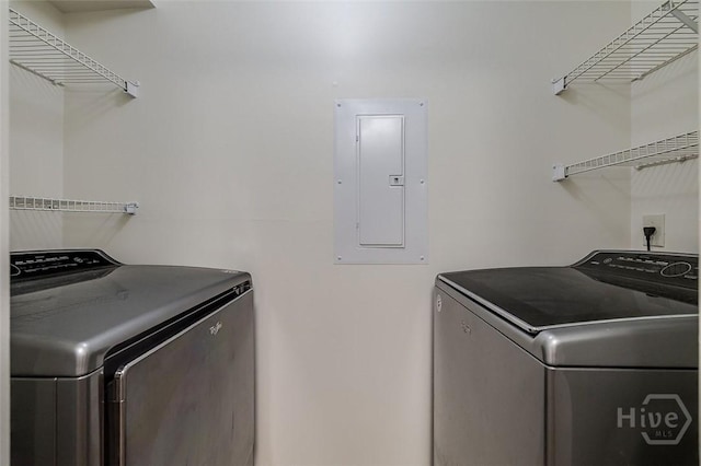 12300 Apache Ave Unit 1206, Savannah, GA 31419 - laundry area with electric panel and washer and clothes dryer