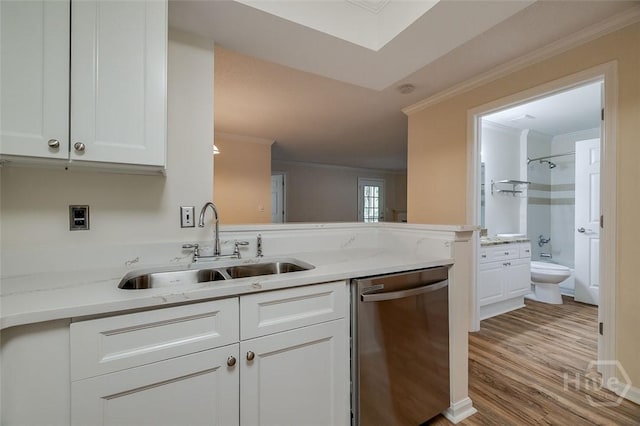 12300 Apache Ave Unit 1206, Savannah, GA 31419 - kitchen featuring stainless steel dishwasher, a sink, crown molding, white cabinetry, and light wood-style floors