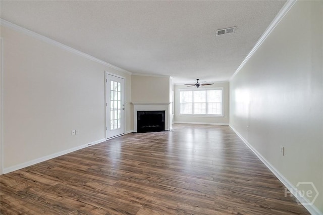 12300 Apache Ave Unit 1206, Savannah, GA 31419 - unfurnished living room with crown molding, ceiling fan, dark wood-style flooring, baseboards, and a textured ceiling