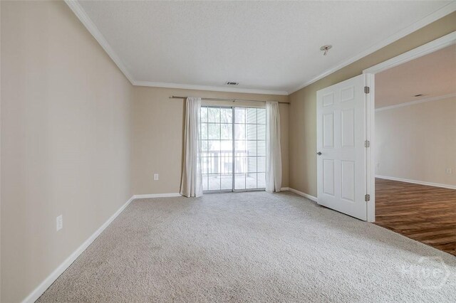 12300 Apache Ave Unit 1206, Savannah, GA 31419 - carpeted empty room featuring baseboards and crown molding