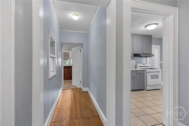 1419 E 35th St, Savannah, GA 31404 - corridor featuring a textured ceiling and light wood finished floors