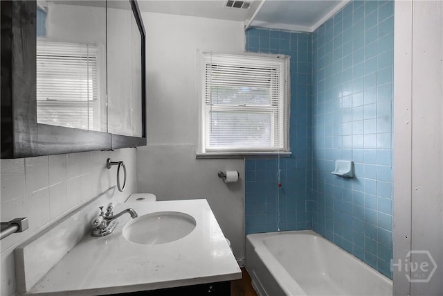 3114 Wright St, Savannah, GA 31404 - full bathroom featuring a tub and vanity