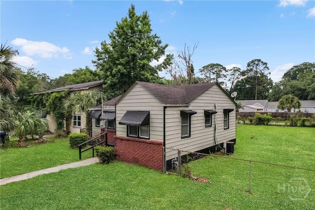 3114 Wright St, Savannah, GA 31404 - view of side of home featuring central AC and roof with shingles