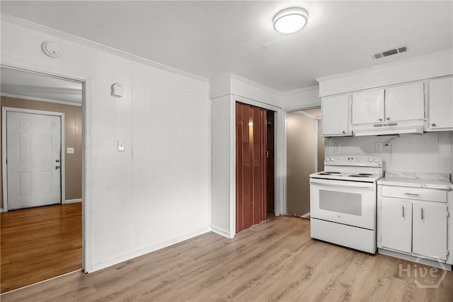 3114 Wright St, Savannah, GA 31404 - kitchen featuring electric range, light countertops, white cabinetry, under cabinet range hood, and crown molding