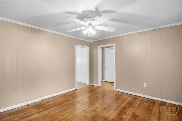 3114 Wright St, Savannah, GA 31404 - empty room with wood finished floors, ceiling fan, baseboards, and ornamental molding