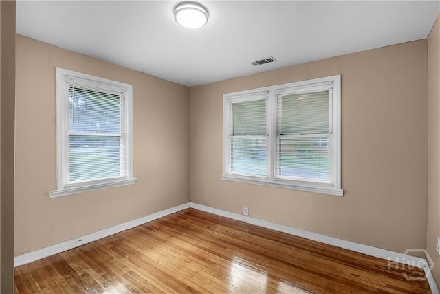 3114 Wright St, Savannah, GA 31404 - unfurnished room with baseboards and hardwood / wood-style flooring