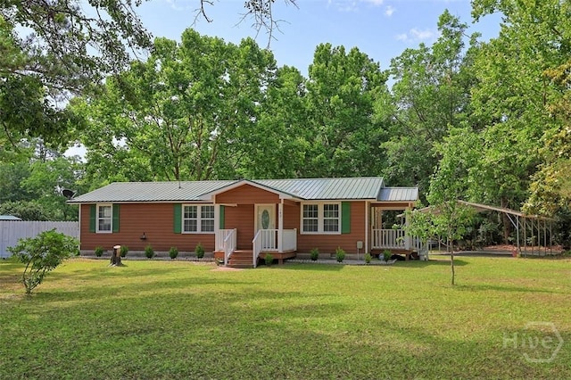 142 Bill Brown Rd, Pembroke, GA 31321 - view of front of home featuring a metal roof