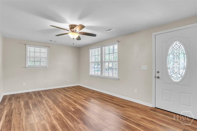 142 Bill Brown Rd, Pembroke, GA 31321 - entrance foyer with healthy amount of natural light, wood finished floors, and ceiling fan