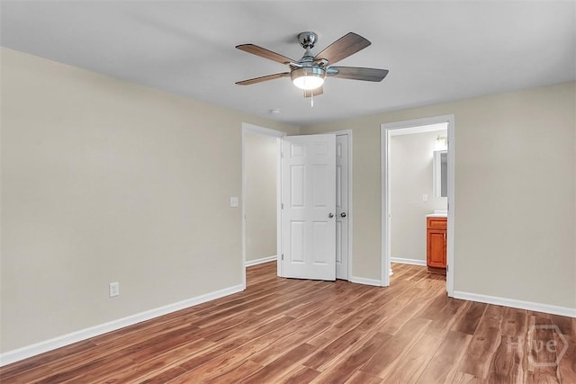 142 Bill Brown Rd, Pembroke, GA 31321 - unfurnished bedroom with light wood finished floors and ceiling fan